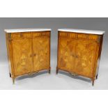 A pair of French Louis XVI style quarter veneered kingwood cupboards, 19th century,