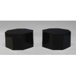 A pair of black resin and fibre glass octagonal low tables, c.