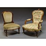 A Victorian walnut and line inlaid armchair, with oval mount to top rail,