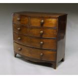 A Victorian mahogany bow front chest of drawers, with two short and three long graduated drawers,