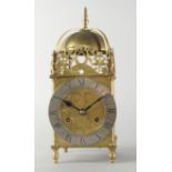 A brass lantern clock, in the 17th century style, early 20th century, with key and pendulum, 33.
