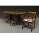 A George III style mahogany and crossbanded extending pedestal dining table, 20th century,