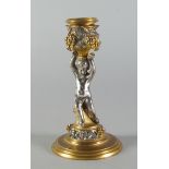 A French silvered and gilt bronze candlestick, late 19th century,