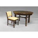 An Art Deco coromandel wood oval extending dining table,