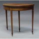 An Edwardian mahogany and line inlaid card table, 76cm high x 84cm high x 42cm deep,