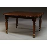 A Victorian style mahogany wind out dining table,