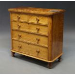 A Victorian satinwood chest of two short above three long drawers, on turned feet,