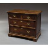 An oak chest, late 17th century and later, with two short and two long drawers, on bracket feet,