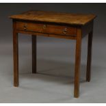 A George III oak single drawer side table raised on square supports,