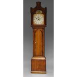 A George III oak and mahogany banded long case clock, the hood with oval patera inlay,