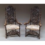 A pair of Carolean style chairs, 19th century, with pierced floral back,