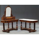 A Victorian mahogany wash stand, central mirror above drawered super structure, on turned supports,