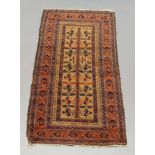 An Afghan rug, the rectangular field with leaf design, multiple border,