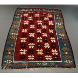 A Turkish Kilim, the red field enclosed by eau de nil border,