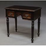 A Colonial style hardwood table, late 20th century, with rectangular top, carved with lobed edge,