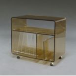 A rectangular lucite and chrome music centre stand, 20th century, attributed to be of Swiss design,
