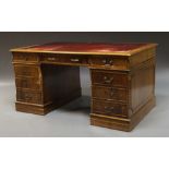 A rectangular mahogany pedestal desk, late 20th century,