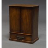 An Edwardian mahogany rectangular wall mounted cabinet,