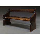 A pine church pew, late 19th/early 20th century,