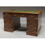 A rectangular mahogany pedestal desk, late 20th century,