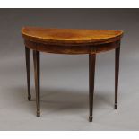 A mahogany and satinwood banded card table, early 19th century, on square tapering legs,