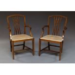 A pair of Edwardian mahogany and line inlaid armchairs, with pad seats,