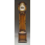 An oak cased grandmother clock, 20th century, with weights and pendulum,