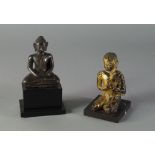 A bronze model of a seated Buddha, late 19th / 20th century,