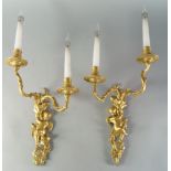 A pair of French two branch wall lights, 20th century,