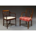 A George III mahogany open arm elbow dining chair with three pierced splats and inlaid top rail on