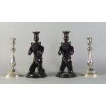 A pair of silver plated candlesticks by Christofle, 20th century, 23cm high,