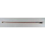 A nickel mounted violin bow, circular stick, indistinctly stamped to end, 54grms.
