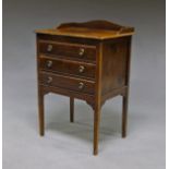 An Edwardian mahogany sheet music chest, with galleried top above three short drawers,