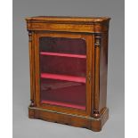 A Victorian walnut and brass mounted pier cabinet,