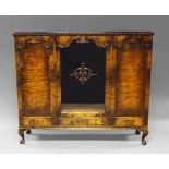 A walnut and glazed rectangular cabinet, early 20th century, the top with gadrooned edge,