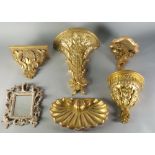 A set of three rectangular form gilt wood wall brackets, of recent manufacture,