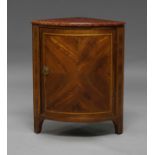 A French kingwood and line inlaid encoignure, mid 18th century, with red marble top,