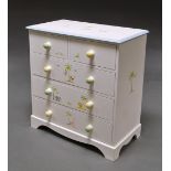 A Dragons of Walton Street 'On Safari' children's white painted chest of drawers,