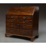 A George III mahogany bureau, fall front above two short and three long drawers, on bracket feet,