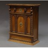 An Italian walnut side cabinet, 19th century, with single long drawer above cupboard door,