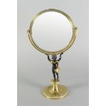 A French Empire style mirror, 20th century, the round mirror in a U form support,