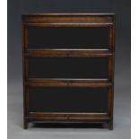 A Globe Wernike three section bookcase, late 19th/early 20th century, with glazed doors,