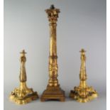 A pair of French gilt metal lamp bases, overall moulded with vines and grapes,