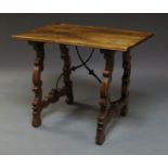 A Spanish rectangular table, late 19th/early 20th century, with shaped end supports,