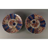A pair of Japanese Imari pattern porcelain plates, late 19th/early 20th century,