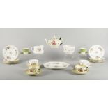 Minton: A Marlow pattern part tea set, to comprise a square plate, twelve tea cups, twelve saucers,