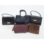 A collection of thirty various handbags, many unused,