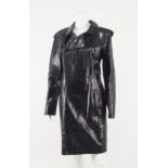 Emilio Pucci: a black python skin coat, concealed double breasted popper fastening,