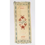 A woven folk-art rug, American, early to mid 20th century, woven in ancient Peruvian style,