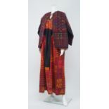 A Jordanian embroidered full length dress, together with similar jacket,